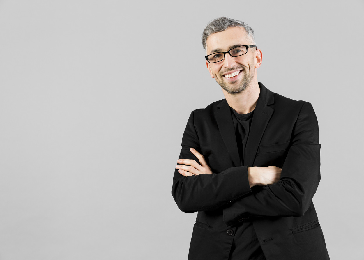 Modern founder collaborating with MVP development agencies using AI-powered software development tools, rapid prototyping platforms, and product strategy dashboards.